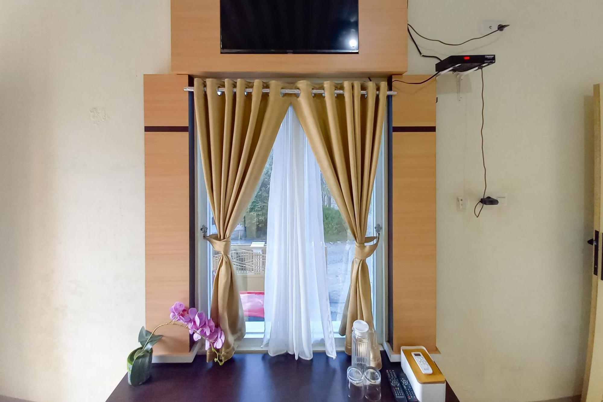 Aroel Homestay Mitra Reddoorz Muara Bungo Exterior foto